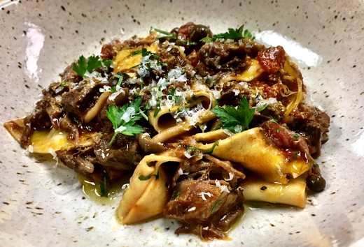 Egg Papparelle with a Zinfandel Braised Short Rib Ragu, Preserved Tomatoes and Mushrooms